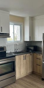 3 1/2 entièrement rénové, poêle frigo inclus, face à la base militaire, possibilité louer meublé 1075$/mois 1er juin - Photo 4