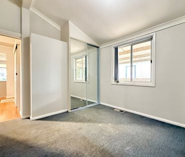 Spacious 4-Bedroom Home - Photo 1