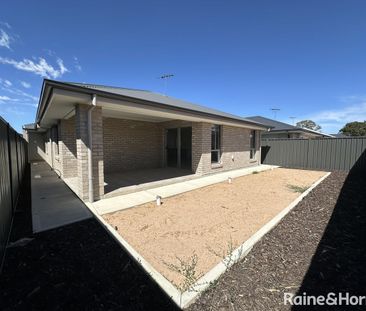 Modern Family Living in the Heart of Munno Para Downs - Photo 4