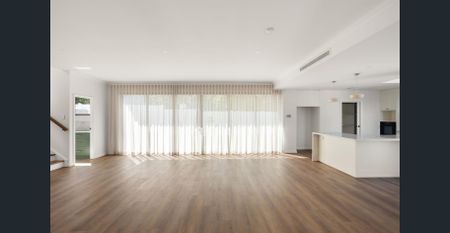 Executive Living with Designer Finishes in Sought-After Locale! - Photo 2