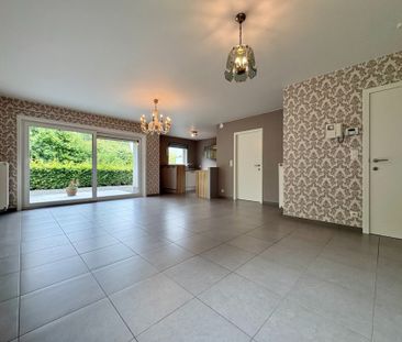 Gelijkvloers appartement met 2 slaapkamers, garage, terras en tuin. - Foto 1