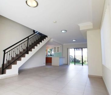 Spacious Three Bedroom Duplex Home - Photo 1
