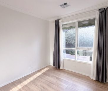 Family Home with Multiple Living Areas and Year-Round Comfort - Photo 1