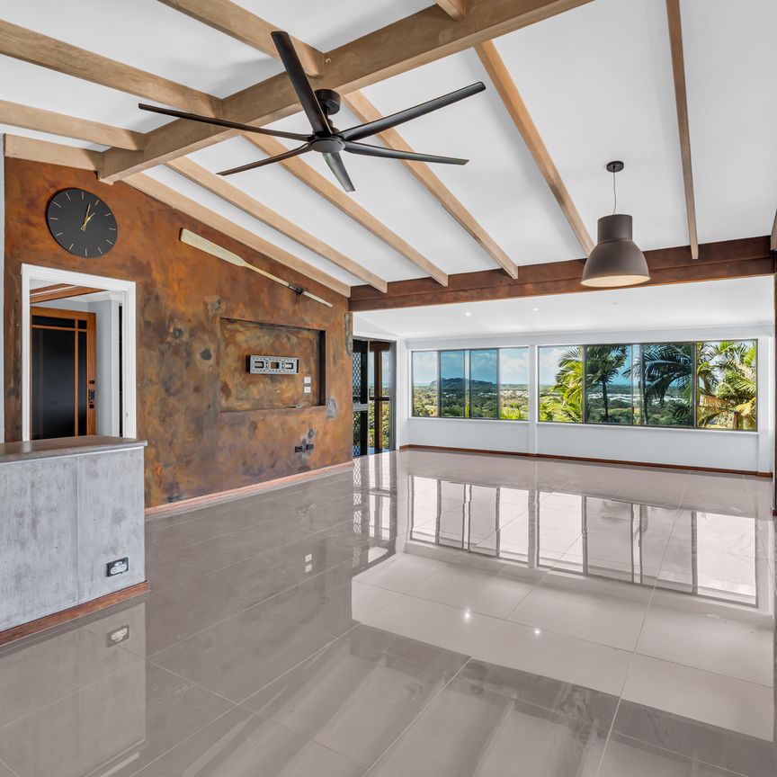 TWO-LEVEL HOME WITH PANORAMIC OCEAN VIEWS - Photo 1