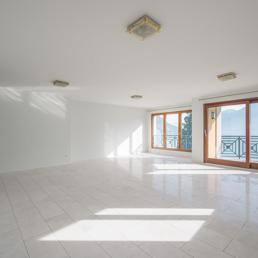 AMPIO APPARTAMENTO IN PRIMA FILA LAGO - Photo 1