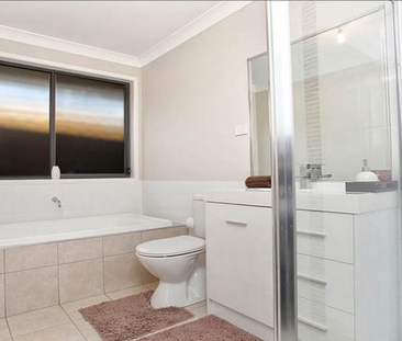 Located in Parkbridge Estate Middleton Grange - Photo 1