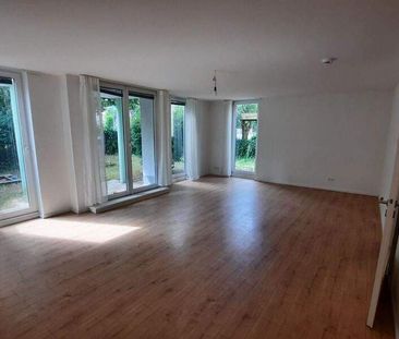 Lichtdurchflutete Maisonette-Wohnung mit Gartenidylle - Photo 1