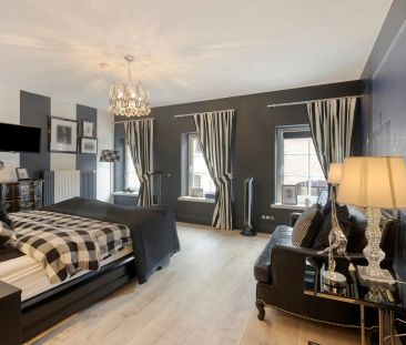 Karaktervolle woonst met indrukwekkend interieur in hartje Oud-Rekem! - Photo 6