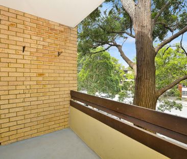 Conveniently Located with a Lock-Up Garage - Photo 2