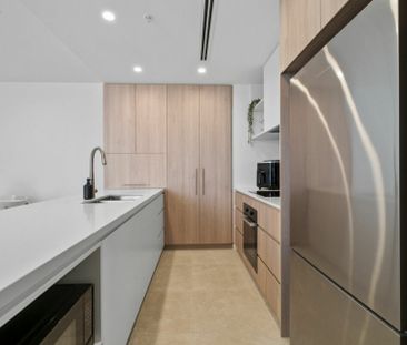 LUXURY COASTAL TWO BEDROOM APARTMENT - FOOT STEPS TO THE BEACH! - Photo 4