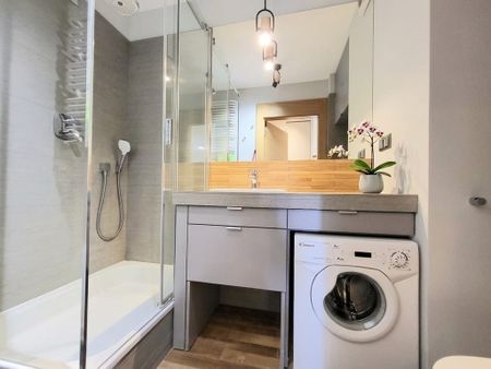 Świetnie urządzona kawalerka z komórką i garażem 34.18 m² - Photo 5