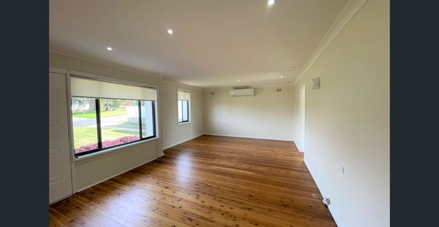 Modern Comfort and Convenience in this 3 Bedroom Gem - Photo 1