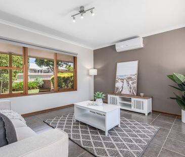 Stylish and Low-Maintenance Living in Prime Newtown Location - Photo 1