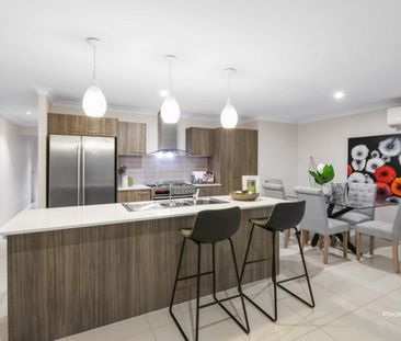 Stylish Family Living with Multiple Living Zones & Beautiful Outdoo... - Photo 2