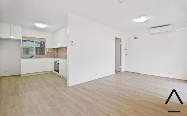 Renovated, Spacious and Sun-Drenched One Bedroom Apartment , Conveniently Located - Photo 1