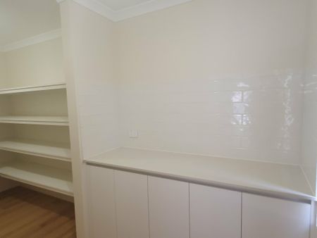 Spacious 4 x 2 Family Home with Study, Theatre & Quality Finishes - Photo 4