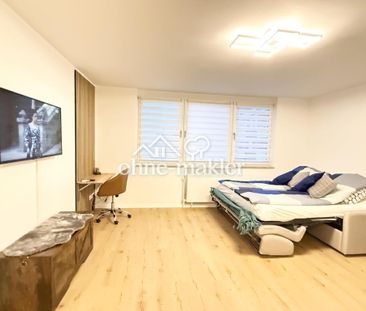 Erstbezug nach Sanierung – hochwertig möbliertes Apartment mit Tief... - Foto 5