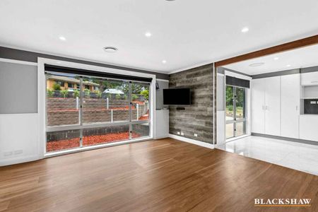 Stylishly Renovated Home with Sunroom Retreat - Photo 3