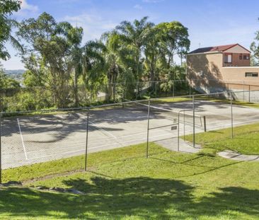 RENOVATED DUPLEX WITH POOL AND TENNIS COURT IN COMPLEX - Photo 4