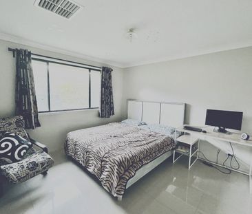 Spacious Four-Bedroom Family Home with Multiple Living Areas!! - Photo 6