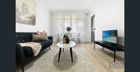 Bright, Renovated, and Only 3 Minutes From The Station and Shops - Photo 2