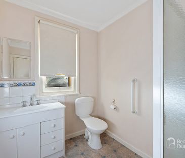 COMFORTABLE TWO-BEDROOM HOME WITH VERSATILE RUMPUS ROOM - Photo 5