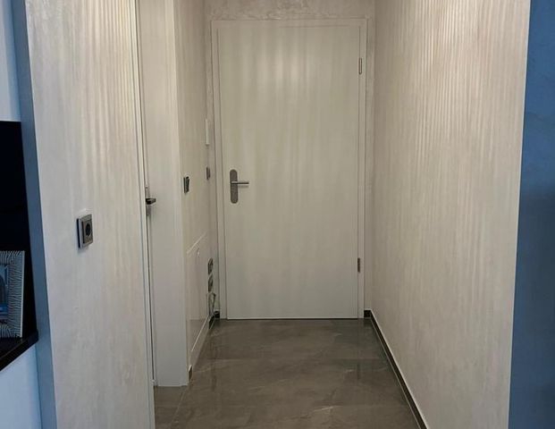 Exklusives 41 m² Souterrain-Apartment mit Garten – Luxus im kompakten Format - Foto 1
