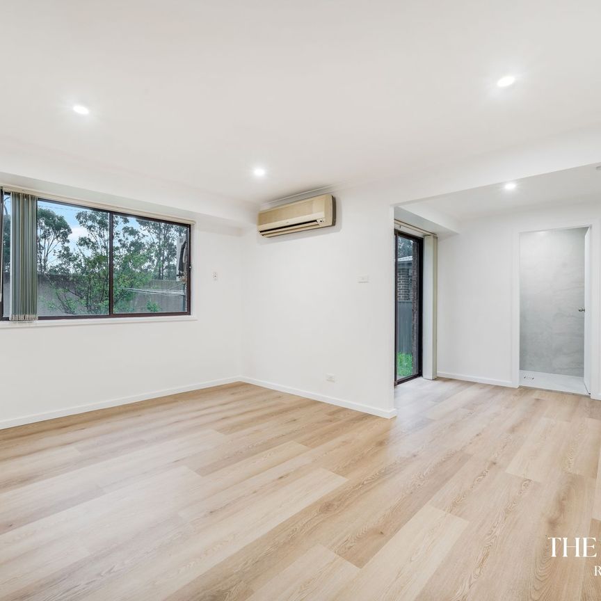 Newly Renovated Family Home in Sought after Bossley Park - Photo 1
