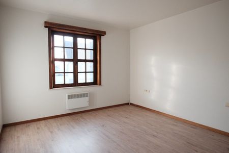 Vernieuwde rijwoning met tuin en grote garage - Photo 3