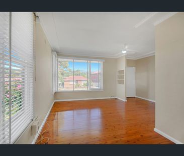 Charming Wollongong Haven: Your Spacious Single-Level Dream Home - Photo 2