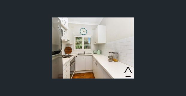 Impressive two bedroom apartment in prized position - Photo 1