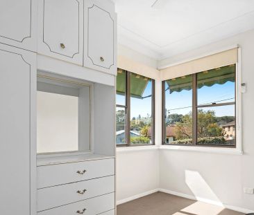 Live in comfort while relishing the picturesque beauty of Lake Macq... - Photo 3