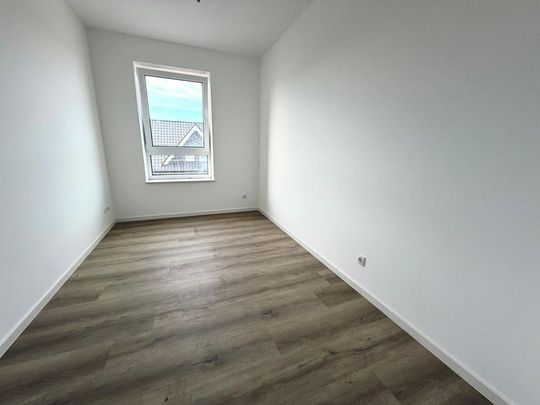 Moderne 3-Zimmer-Neubauwohnung mit Balkon in Ankum - Photo 1
