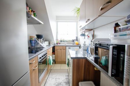 Moderne 2 Zimmer-Wohnung im Dachgeschoss mit Loggia und Stellplatz - Foto 4