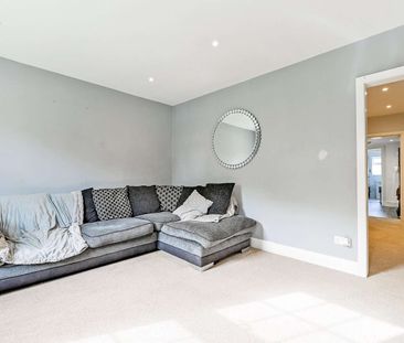 A spacious three bedroom home with allocated parking for two cars. - Photo 2