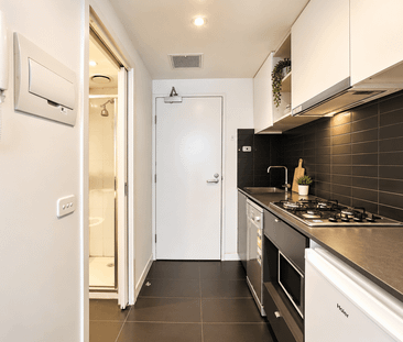 Furnished & Light-Filled Studio in Prime North Melbourne Location - Photo 4