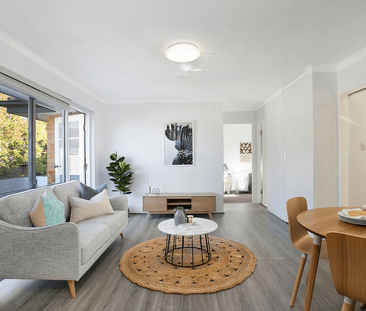 Two Bedroom Apartment With Convenience at Your Doorstep - Photo 1