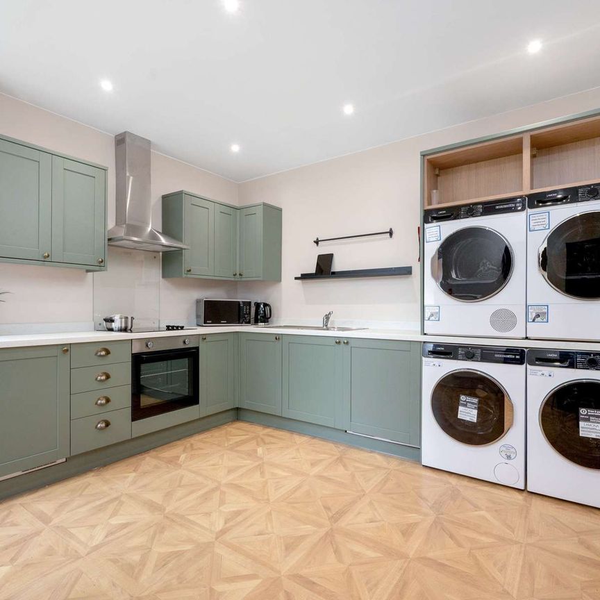 Step into stylish city living with this high-spec HMO in a stunningly repurposed pub—a perfect blend of character and modern comfort. Located in the heart of Derby City Centre (DE1), this beautifully converted property offers large studios and en-sui Room 5 - Photo 1
