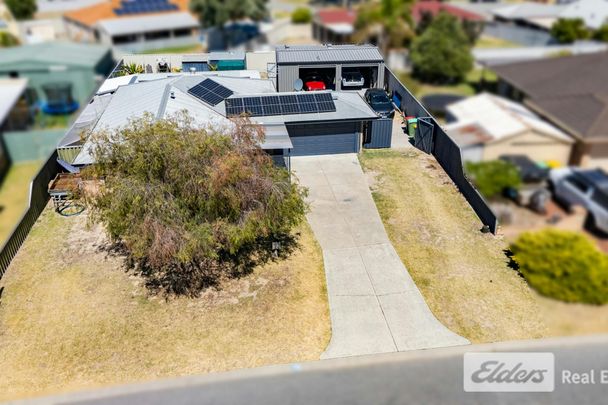 LAID BACK FAMILY LIVING WITH SIDE ACCESS AND LARGE, POWERED WORKSHOP - Photo 1