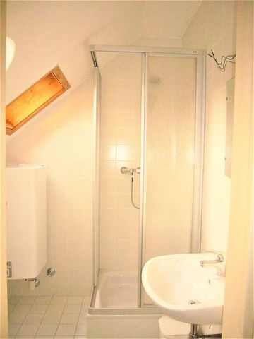 Sonnige 2-Zimmer-Dachgeschosswohnung mit Grünblick, Terrasse & Kachelofen – 47 m² in Leoben-Zentrum - Foto 4