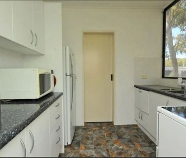 CONVENIENTLY LOCATED TWO BEDROOM UNIT - Photo 2