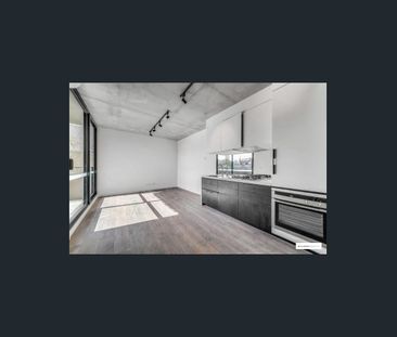 Stylish 2-Bedroom Apartment with Secure Stacker Parking - Photo 3