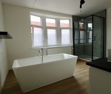 Gerenoveerde rijwoning met 2 slaapkamers en stadskoer. - Foto 5