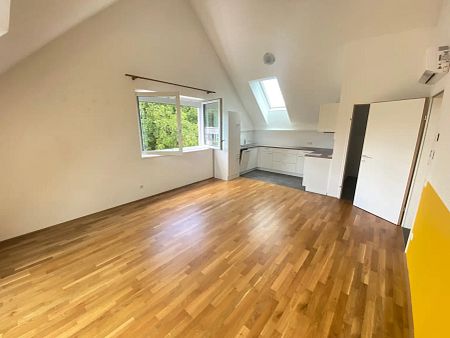 2 ZIMMER DACHGESCHOSSWOHNUNG MIT PARKPLATZ UND KLIMAANLAGE - Photo 4