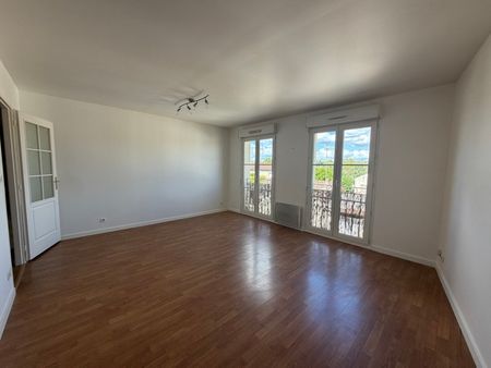 Appartement à louer - Photo 2