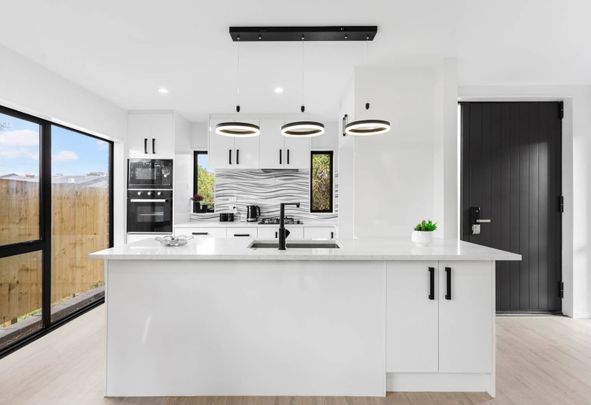 Magnificent in Manurewa - Photo 1