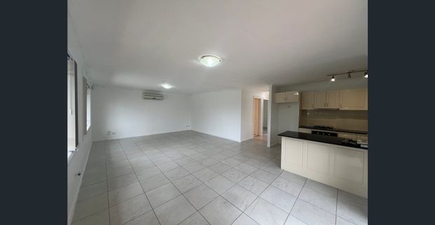 FIVE MINUTE WALK TO SHOPS - Photo 1