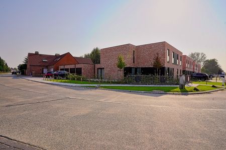 Prachtig Nieuwbouwappartement met 2 slaapkamers en eigen tuin in Klein-Sinaai - Photo 3