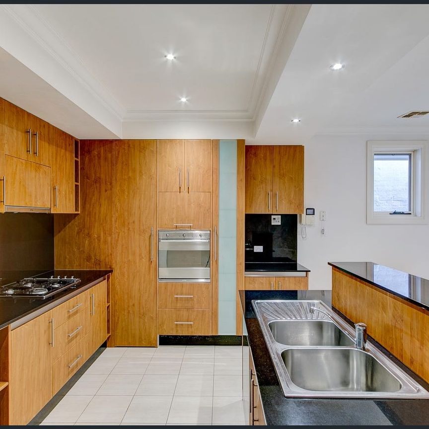 FAMILY SIZED TOWNHOUSE” - Photo 1