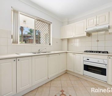 Expansive Courtyard Apartment with Resort-Style Living - Photo 2